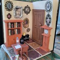 Libro scultura con dentro un angolo di casa.