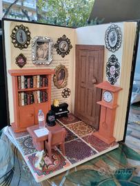 Libro scultura con dentro un angolo di casa.