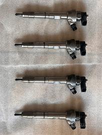 4 iniettori Bosch 0445110473 VW 04L130277AD Tiguan
