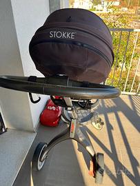 Passeggino Stokke con accessori