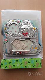 Cornice realizzata a mano su lastra argento