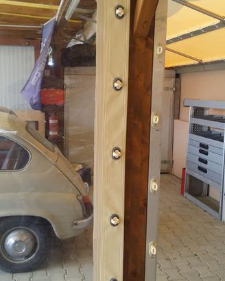 Telo in pvc con aggiunta di finestra