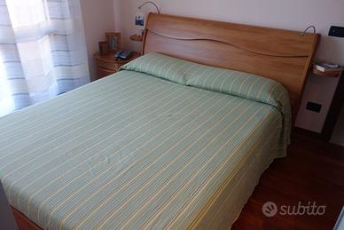 Camera matrimoniale, letto e armadio con cabina