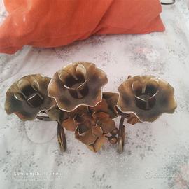 Candelabro in metallo lavorato 4 fiori