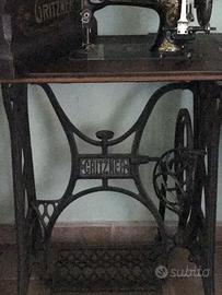 Mobile d'epoca in ghisa con macchina da cucire