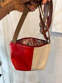 Stock trousse vera pelle