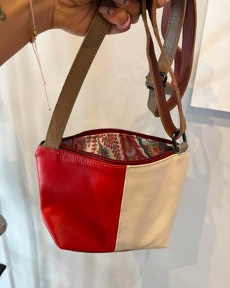 Stock trousse vera pelle