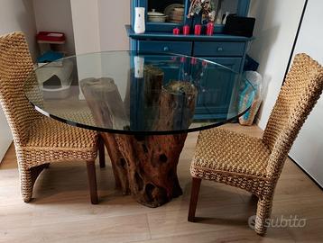 Tavolo in cristallo con sei sedie