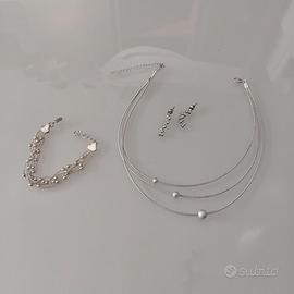 Collana, bracciale, orecchini. Color Argento
