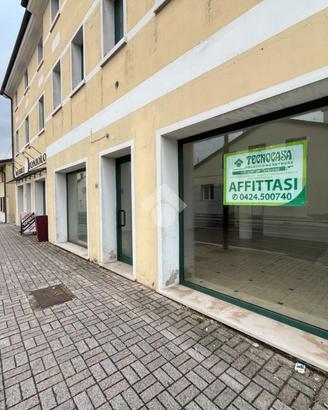 NEGOZIO A ROSÀ