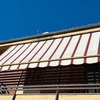 TENDA PARASOLE A RULLO.
