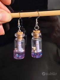 interessanti orecchini "messaggio in bottiglietta"