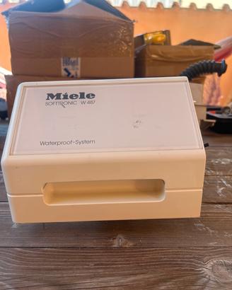 Pompa di carico e cassetto sapone Lavatrice Miele