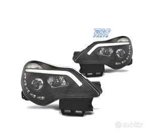 FARI TRU DRL OPEL CORSA D 11-14 NERI