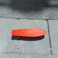 skateboard arancione