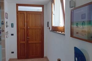 Villetta a schiera con giardino e posto auto