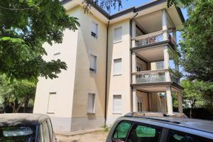 Appartamento con Terrazzo Abitabile e Posto Auto