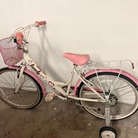 Bicicletta perfetta per 9/12 anni, con rotelle.