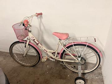 Bicicletta perfetta per 9/12 anni, con rotelle.