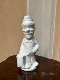 Statuina ceramica Stanlio vintage con valigia
