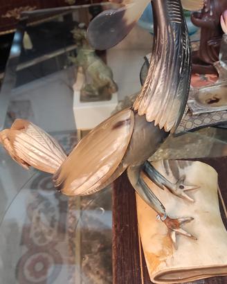 antica scultura gallo