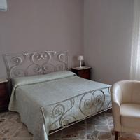 Camera da letto in arte povera