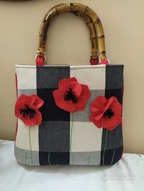 si vende borsa  fatta a mano