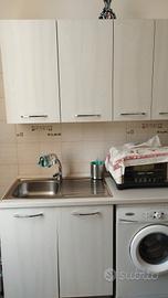 Camera da letto più cucina