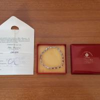 Bracciale in acciaio e stelline in oro 18 Kt
