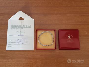 Bracciale in acciaio e stelline in oro 18 Kt