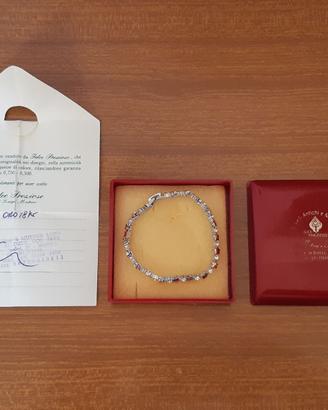 Bracciale in acciaio e stelline in oro 18 Kt