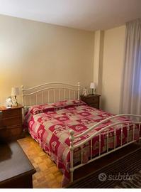 Letto matrimoniale in ferro battuto bianco