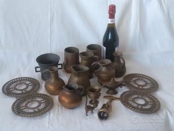 10 kg di vasi ,mortai ed oggetti vari in bronzo .