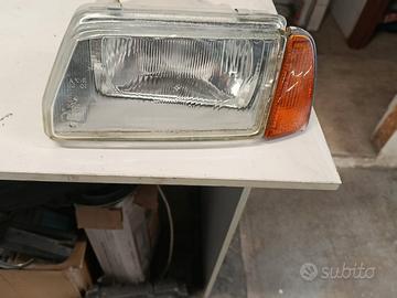 FARO ANTERIORE SX COMPLETO DI FRECCIA FIAT 500 ANN