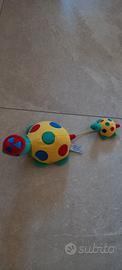 peluche tartaruga musicale con piccolo