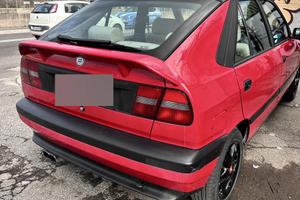 Lancia delta targa oro