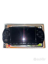 PSP usata + 3 giochi.