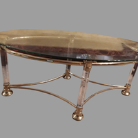 tavolino ottone  ovale con colonne in plexiglas