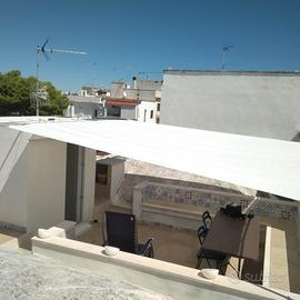 Appartamento con terrazza in pieno centro