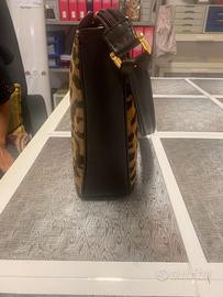 borsa Luigi Bevilacqua in velluto manuale