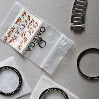 Omega Ghiere e parti Seamaster 300 e Speedmaster 
