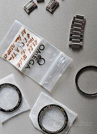 Omega Ghiere e parti Seamaster 300 e Speedmaster 