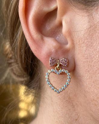 Orecchini pendenti con fiocco rosa e cuore strass