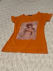 T-shirt arancione stampa bambola