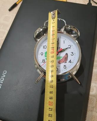 sveglia meccanica con gallina che becca