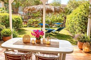 Appartamento con patio e giardino privato