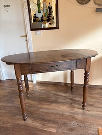 Tavolo in noce ovale allungabile