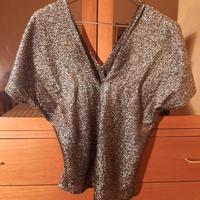 blusa dorata e cintura