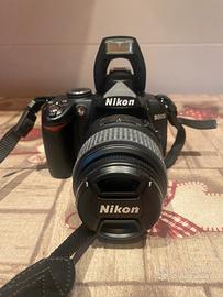 Nikon D3000 completa di accessori