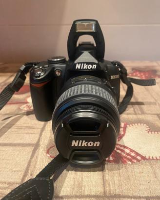 Nikon D3000 completa di accessori